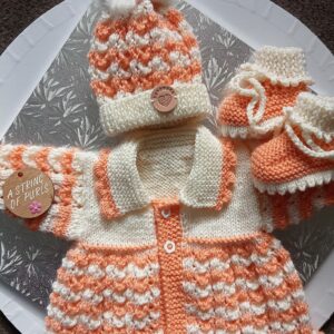 baby handknitted going home outfit