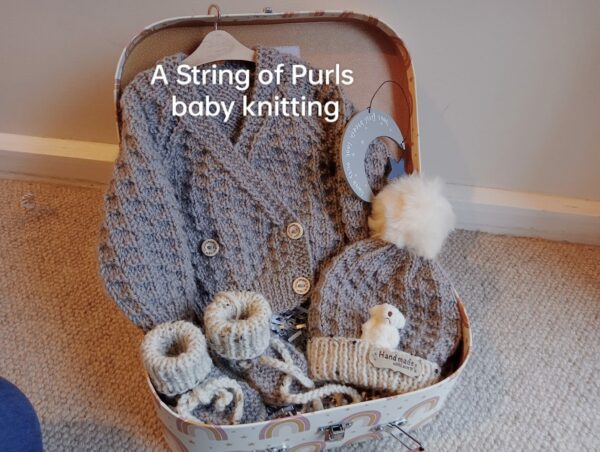 Baby knitting home coming keepsake
